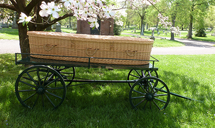 Bellefontaine’s green burial cart is available for green burials throughout the cemetery. Shown here with a willow casket on the Hotchkiss Chapel Plaza.